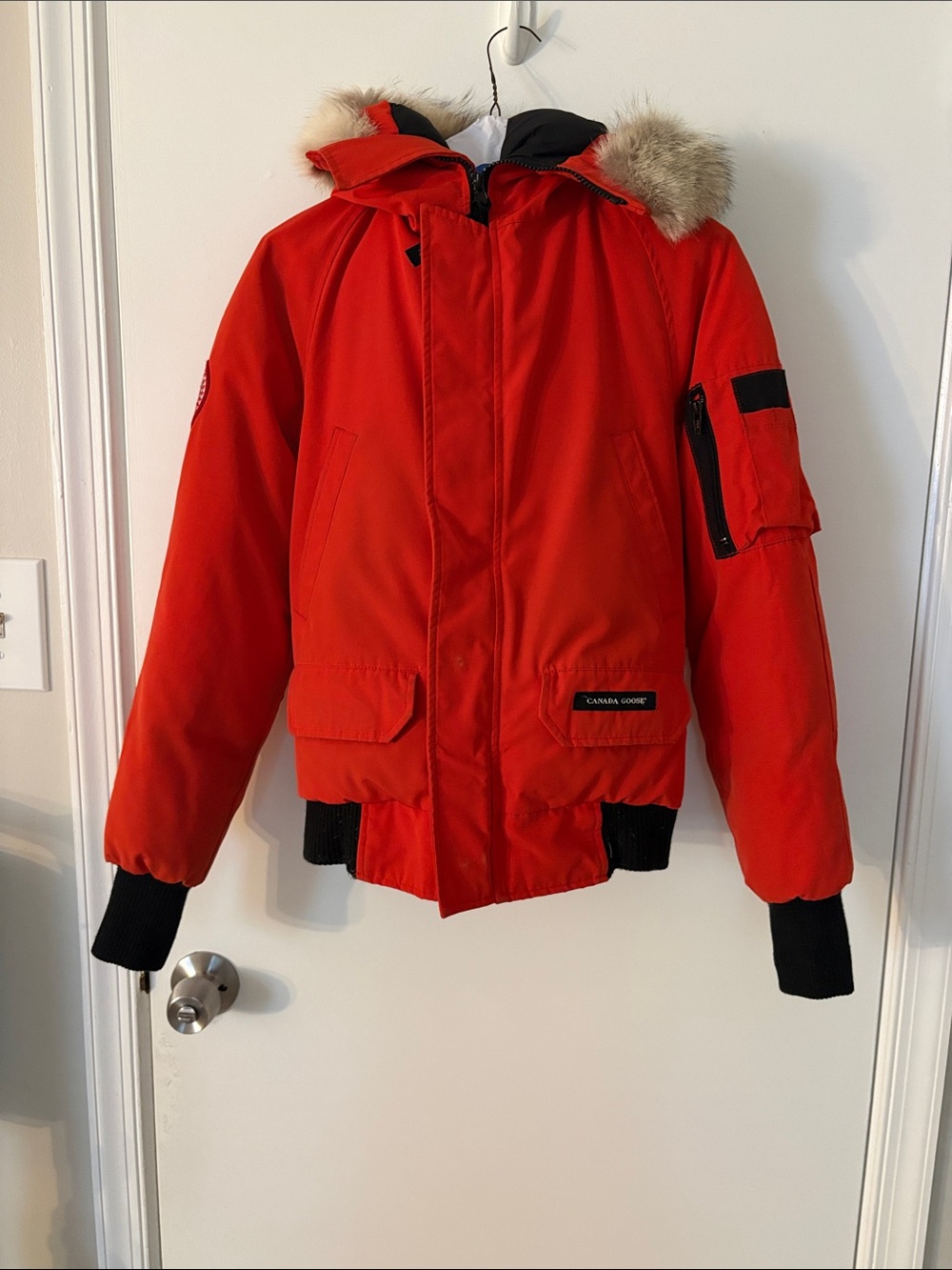 Canada Goose women  Orange Hooded Puffer Jacket with Fur Trim
